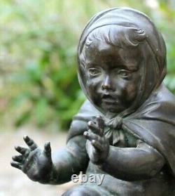 Ancien bronze un enfant ou chérubin