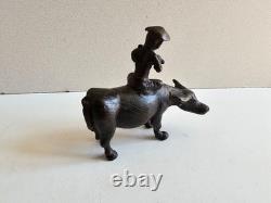 Ancienne Sculpture en bronze Asie Joueur de flute tibetain sur son Buffle