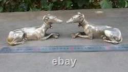 Ancienne paire de sculptures de lévriers ART DECO couchés en métal argenté