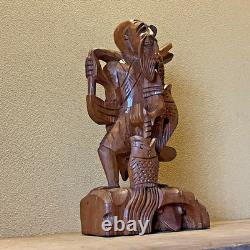 Ancienne statue artisanale pêcheur thaïlandais sculpture sur bois bonne