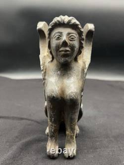 Ancienne statue en pierre mythique civilisation sphinx lion ailé sculpture Mo