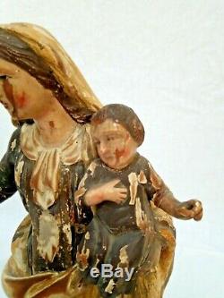 Ancienne vierge à l'enfant en bois sculpté