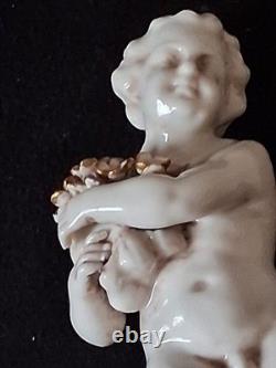 Putti Sculpture ancienne en porcelaine Signée Rudolf Kammer