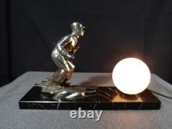 Sculpture statue lampe ancienne art déco régule skieur ski sport d'hivers globe