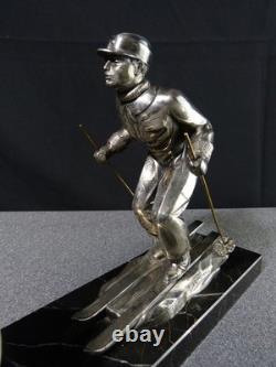 Sculpture statue lampe ancienne art déco régule skieur ski sport d'hivers globe