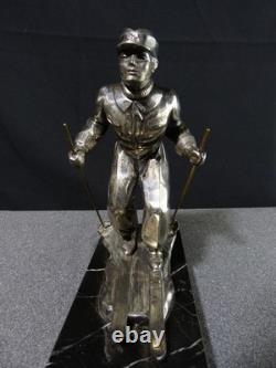 Sculpture statue lampe ancienne art déco régule skieur ski sport d'hivers globe