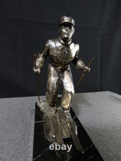 Sculpture statue lampe ancienne art déco régule skieur ski sport d'hivers globe