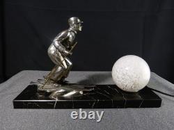 Sculpture statue lampe ancienne art déco régule skieur ski sport d'hivers globe